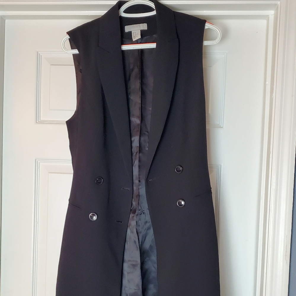 Sleevles trench coat